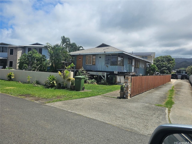 55-506 Iosepa St, Laie, HI 96762 - view of front of house featuring fence private yard