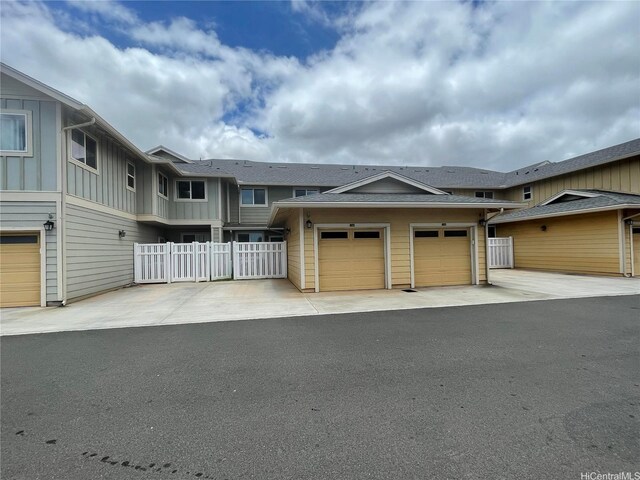 91-960 Iwikuamoo St Unit 304, Ewa Beach, HI 96706 - view of home's exterior with uncovered parking