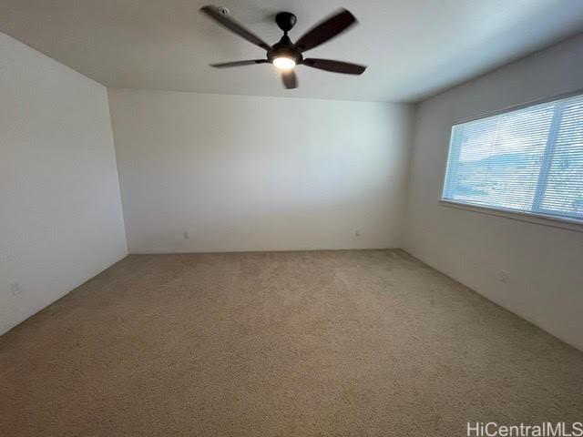 91-960 Iwikuamoo St Unit 304, Ewa Beach, HI 96706 - carpeted empty room featuring ceiling fan