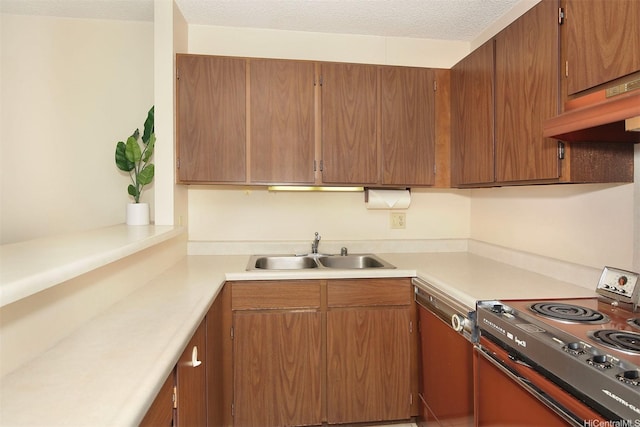 kitchen featuring light countertops, range, a sink, and dishwasher