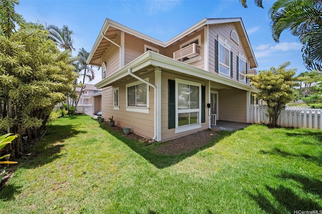 94-831 Lumiauau St Unit H104, Waipahu, HI 96797 - view of side of property featuring a lawn and fence