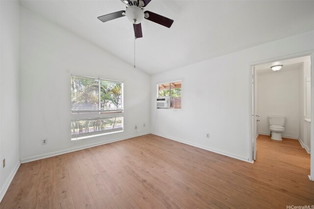 94-831 Lumiauau St Unit H104, Waipahu, HI 96797 - unfurnished bedroom featuring baseboards, cooling unit, light wood-type flooring, and lofted ceiling