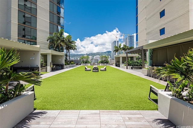 1388 Kapiolani Blvd Unit 2209, Honolulu, HI 96814 - view of community featuring a yard and a view of city