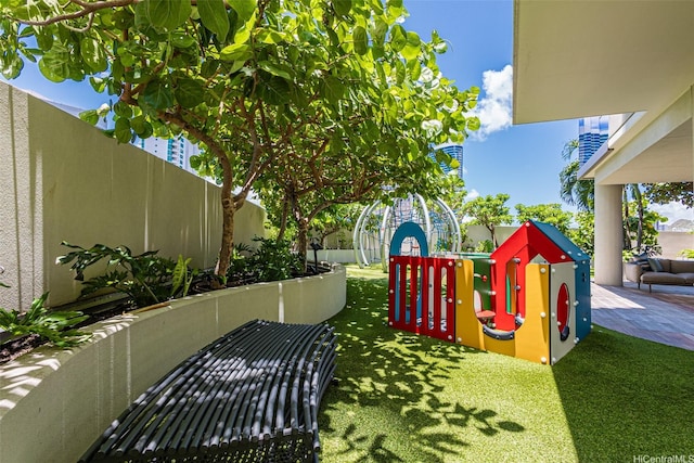 1388 Kapiolani Blvd Unit 2209, Honolulu, HI 96814 - view of yard featuring playground community and fence
