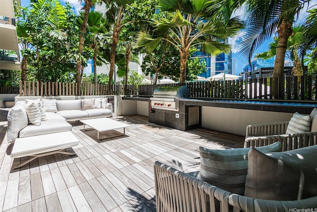 1388 Kapiolani Blvd Unit 2209, Honolulu, HI 96814 - deck featuring fence, area for grilling, an outdoor kitchen, and outdoor lounge area
