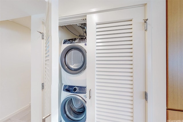1388 Kapiolani Blvd Unit 2209, Honolulu, HI 96814 - washroom with stacked washer and clothes dryer and laundry area