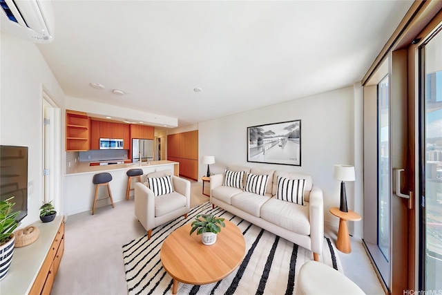 1388 Kapiolani Blvd Unit 2209, Honolulu, HI 96814 - living area with a wall mounted AC, a healthy amount of sunlight, and recessed lighting
