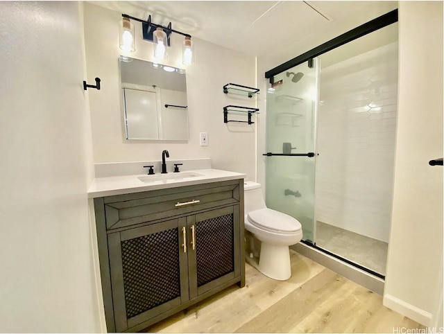 1777 Ala Moana Blvd Unit 901, Honolulu, HI 96815 - full bath featuring vanity, a shower stall, toilet, and wood finished floors