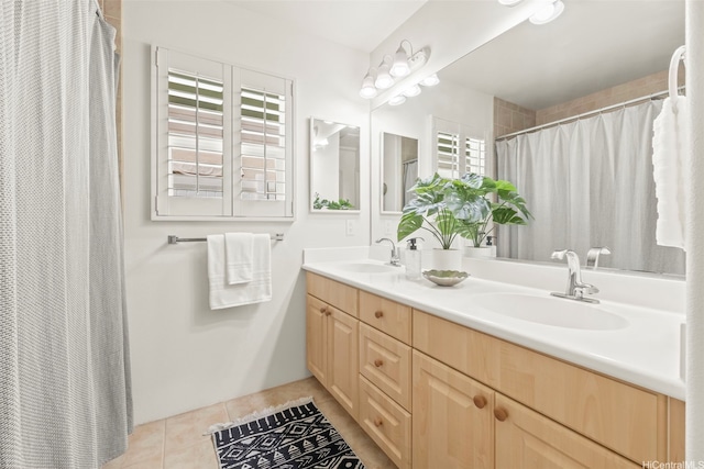 91-1023 Kai Weke St, Ewa Beach, HI 96706 - bathroom featuring double vanity, tile patterned floors, curtained shower, and a sink