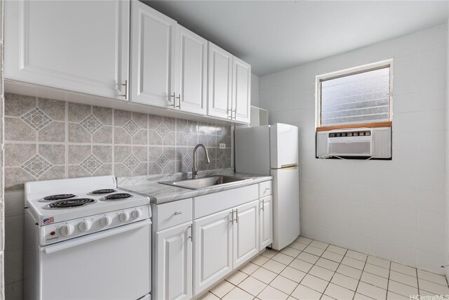 94-245 Leowahine St Unit 239, Waipahu, HI 96797 - kitchen with white appliances, white cabinetry, a sink, and light countertops