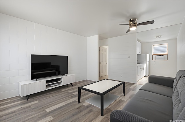 94-245 Leowahine St Unit 239, Waipahu, HI 96797 - living area with cooling unit, a ceiling fan, and light wood finished floors