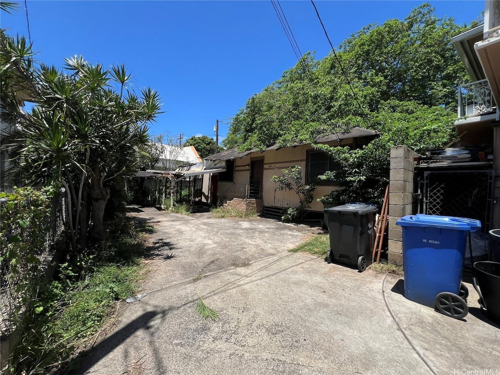 view of side of home featuring a patio area