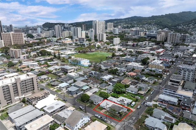 birds eye view of property featuring a city view