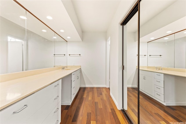 46-130 Kiowai St Unit 2724, Kaneohe, HI 96744 - full bathroom featuring vanity, recessed lighting, baseboards, and wood finished floors