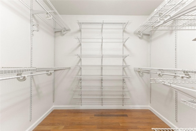46-130 Kiowai St Unit 2724, Kaneohe, HI 96744 - walk in closet featuring wood finished floors