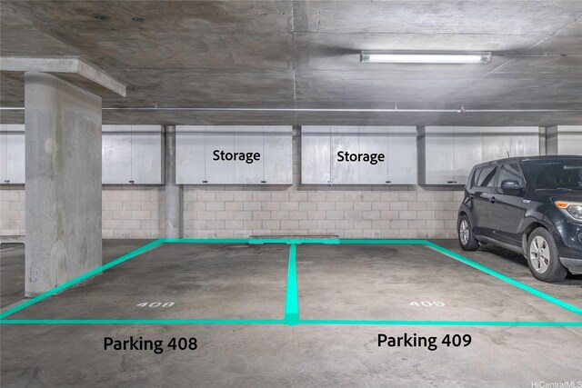 view of vehicle parking with a parking deck