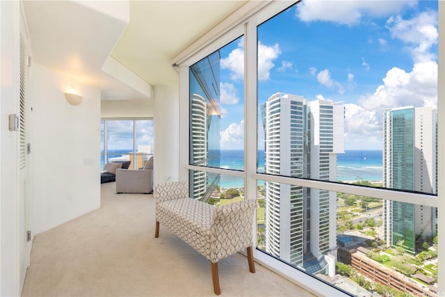 balcony featuring a water view
