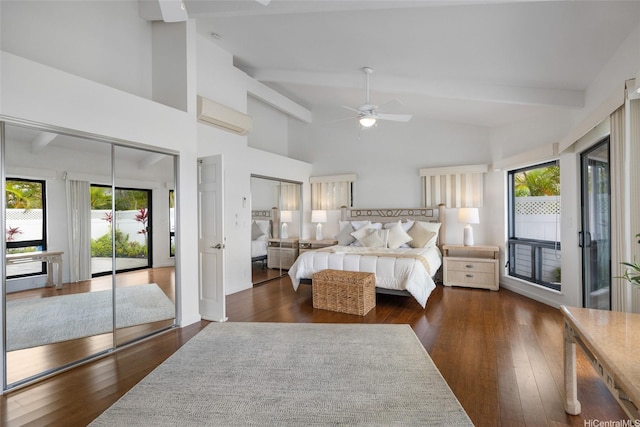 bedroom featuring access to outside, wood finished floors, and a wall mounted air conditioner