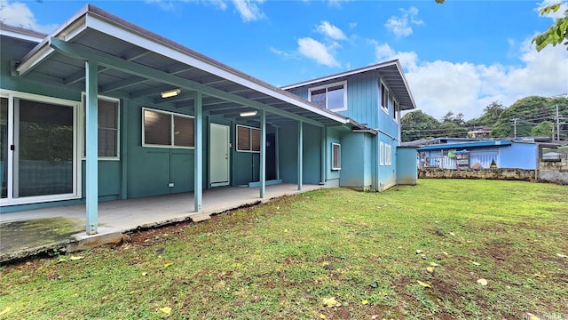 45-1016/45-1016A Anoi Rd, Kaneohe, HI 96744 - rear view of house with a patio and a lawn