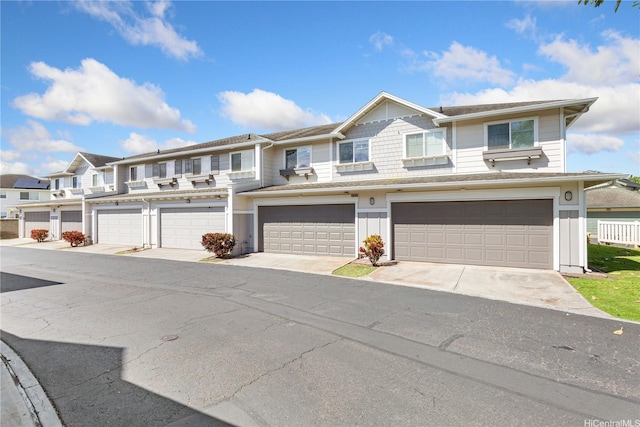 91-1031 Kaimalie St Unit 4B2, Ewa Beach, HI 96706 - townhome / multi-family property featuring a garage