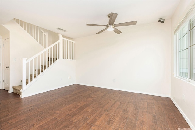 91-1031 Kaimalie St Unit 4B2, Ewa Beach, HI 96706 - unfurnished living room with stairs, visible vents, baseboards, ceiling fan, and dark wood-style floors