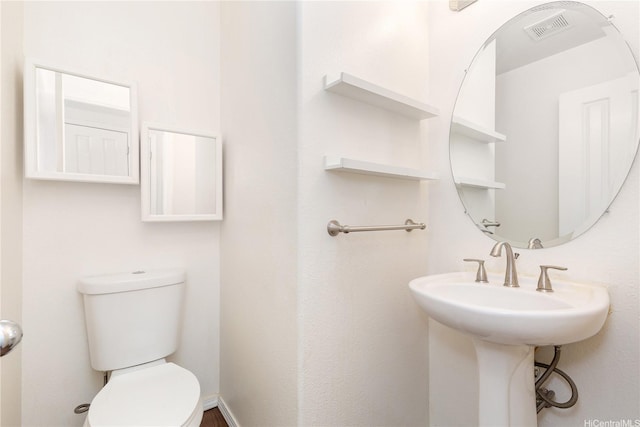 91-1031 Kaimalie St Unit 4B2, Ewa Beach, HI 96706 - bathroom featuring toilet, visible vents, and a sink