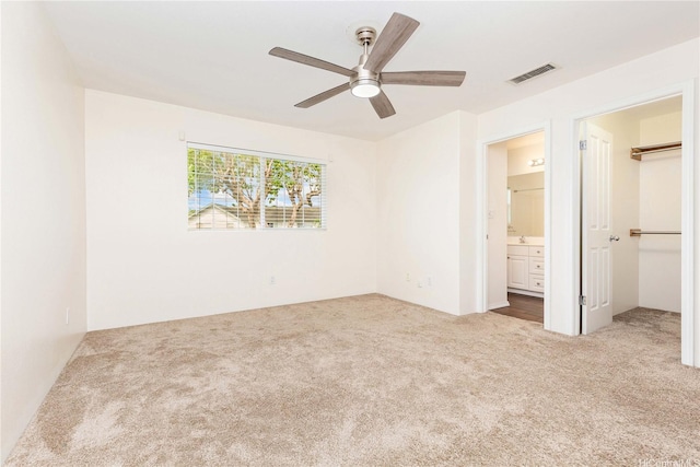 91-1031 Kaimalie St Unit 4B2, Ewa Beach, HI 96706 - unfurnished bedroom with carpet flooring, ensuite bathroom, visible vents, and a spacious closet