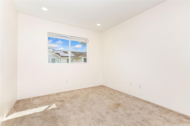 91-1031 Kaimalie St Unit 4B2, Ewa Beach, HI 96706 - carpeted empty room with recessed lighting