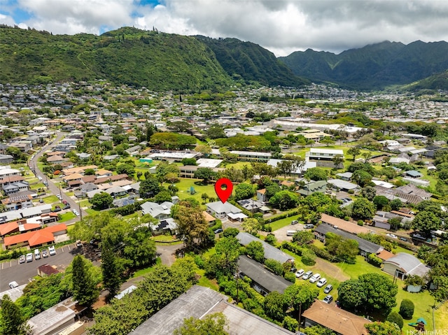 aerial perspective of suburban area with a mountainous background