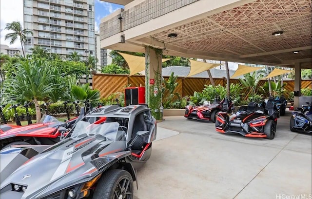 444 Niu St Unit 2513, Honolulu, HI 96815 - view of parking / parking lot featuring fence