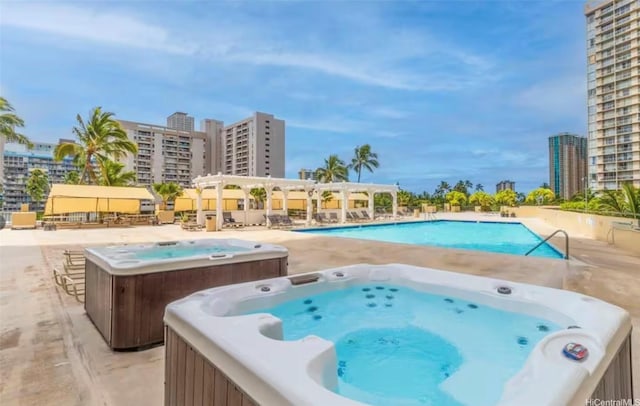444 Niu St Unit 2513, Honolulu, HI 96815 - pool featuring a view of city and a community hot tub