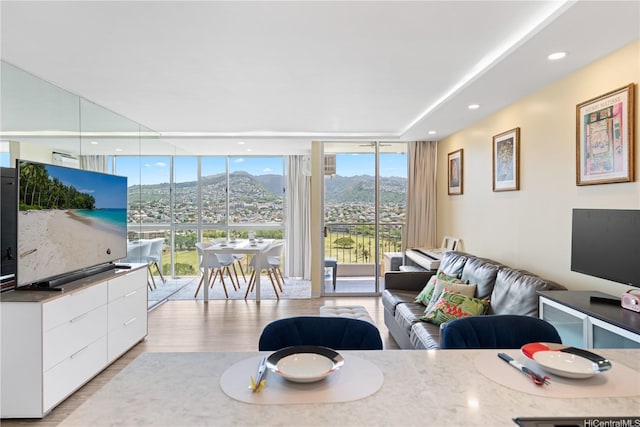 2611 Ala Wai Blvd Unit 1805, Honolulu, HI 96815 - living area with floor to ceiling windows, light wood-style flooring, and recessed lighting