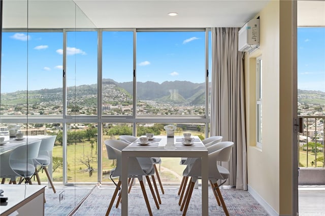 2611 Ala Wai Blvd Unit 1805, Honolulu, HI 96815 - sunroom featuring a mountain view, a wall mounted air conditioner, and plenty of natural light