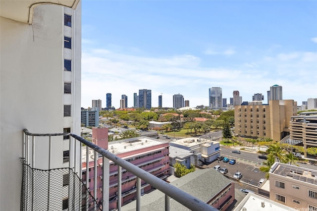 balcony featuring a city view