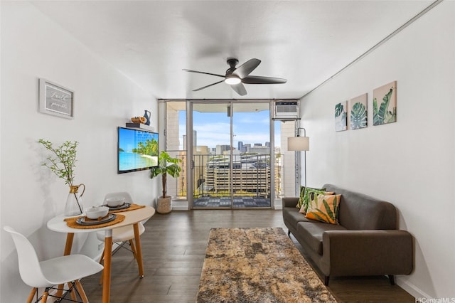 living room featuring floor to ceiling windows, ceiling fan, and wood finished floors