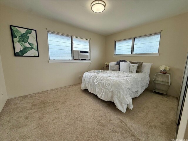 carpeted bedroom with cooling unit
