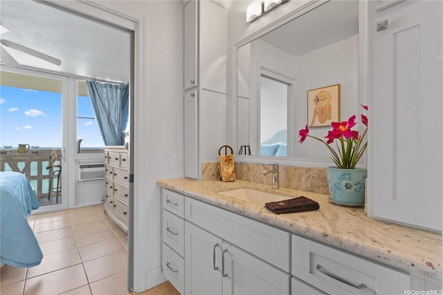 bathroom featuring tile patterned floors and vanity