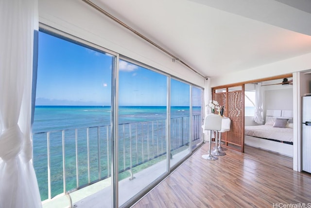 sunroom with a water view