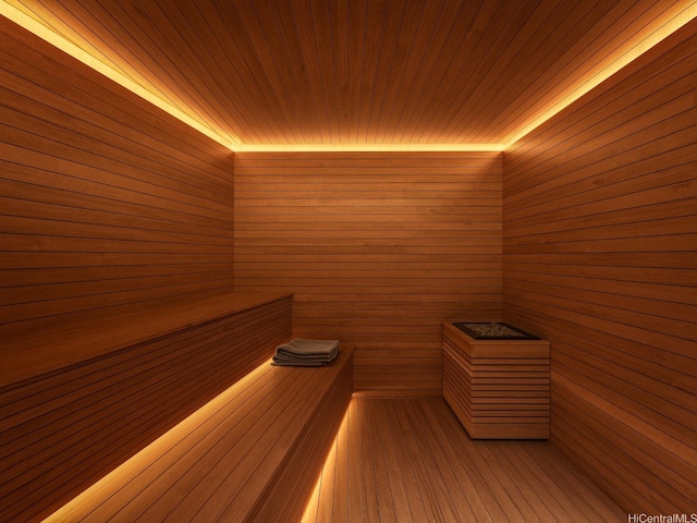sauna / steam room featuring wooden walls and wooden ceiling
