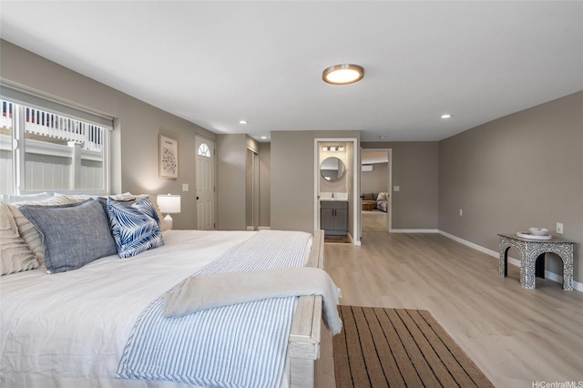 45-008 Mahalani Cir, Kaneohe, HI 96744 - bedroom with recessed lighting, baseboards, ensuite bathroom, and light wood finished floors