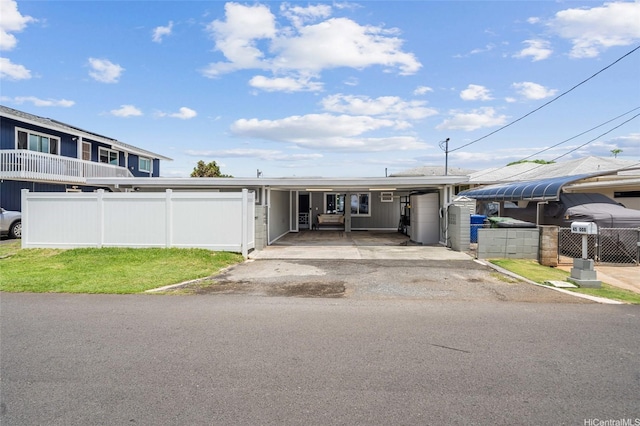 45-008 Mahalani Cir, Kaneohe, HI 96744 - view of front facade with fence and driveway