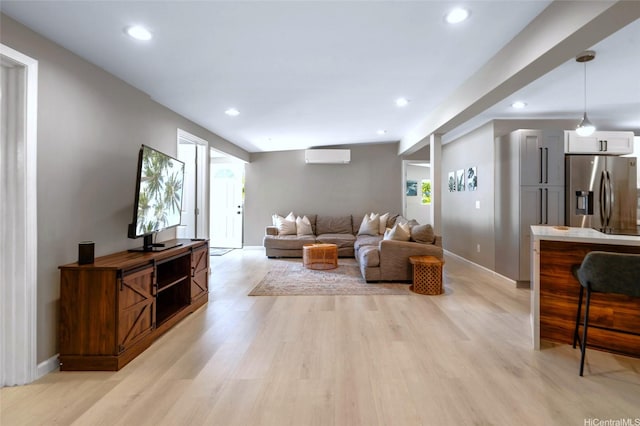 45-008 Mahalani Cir, Kaneohe, HI 96744 - living area featuring recessed lighting, a wall unit AC, light wood finished floors, and a wealth of natural light