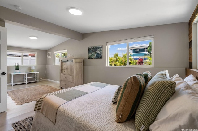 45-008 Mahalani Cir, Kaneohe, HI 96744 - bedroom featuring baseboards, vaulted ceiling with beams, and light wood-style flooring