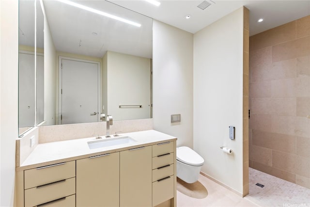 full bathroom with vanity, toilet, recessed lighting, visible vents, and tiled shower