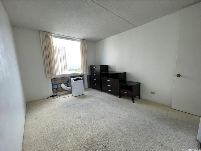 1717 Ala Wai Blvd Unit 2107, Honolulu, HI 96815 - office area with light colored carpet and a textured ceiling