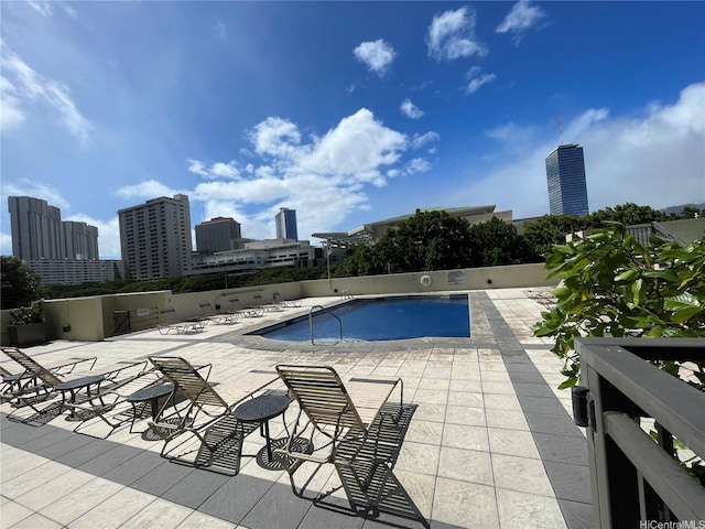 1717 Ala Wai Blvd Unit 2107, Honolulu, HI 96815 - community pool featuring a patio and a skyline view
