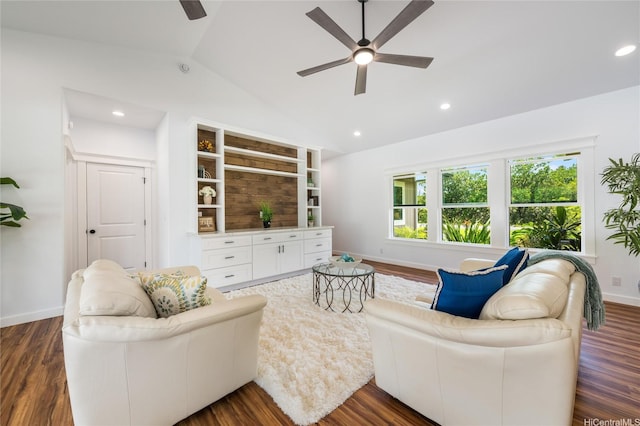 living area featuring dark wood-style flooring, ceiling fan, and lofted ceiling