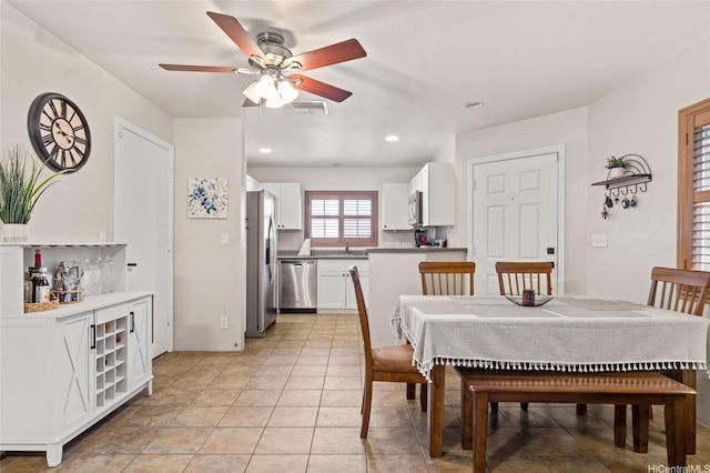 dining room with ceiling fan, recessed lighting, and visible vents