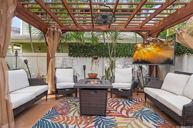 view of patio with an outdoor living space with a fire pit, fence, and a pergola
