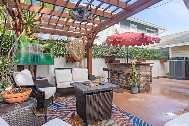 view of patio with a pergola, central AC, a fenced backyard, and an outdoor living space with a fire pit